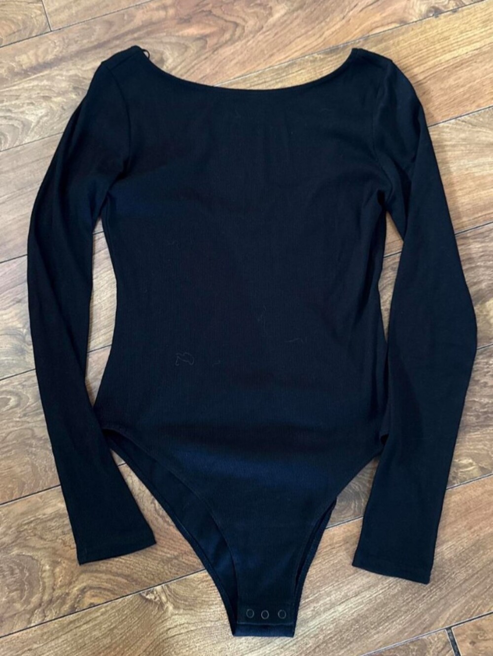 NWT - H&M Black Long Sleeve One-Piece Bodysuit - Size Medium